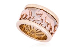 A TRI COLOUR GOLD 'ROTATING PANTHER' RING