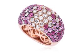 A RUBY, PINK SAPPHIRE AND DIAMOND RING