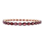 A GARNET FULL ETERNITY BANGLE