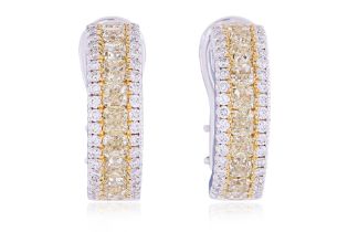 A PAIR OF YELLOW AND WHITE DIAMOND HOOP EARRINGS