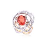 A FIRE OPAL AND DIAMOND RING