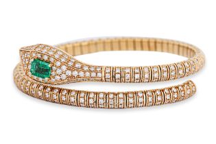 AN EMERALD AND DIAMOND 'SERPENT' BANGLE