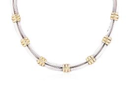 AN 'ATLAS' SILVER AND GOLD NECKLACE BY TIFFANY & CO.