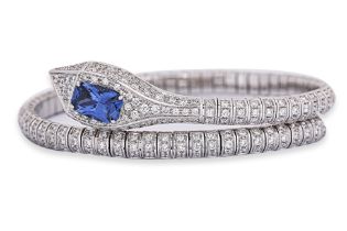 A SAPPHIRE AND DIAMOND 'SERPENT' BANGLE