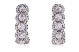 A PAIR OF DIAMOND HOOP STUD EARRINGS