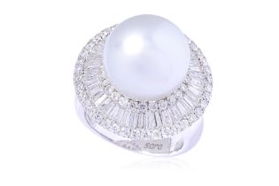 A CULTURED SOUTH SEA PEARL AND DIAMOND RING