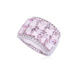 A TWO ROW MORGANITE AND DIAMOND RING