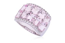 A TWO ROW MORGANITE AND DIAMOND RING