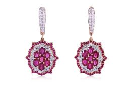 A PAIR OF RUBY AND DIAMOND DROP EARRINGS