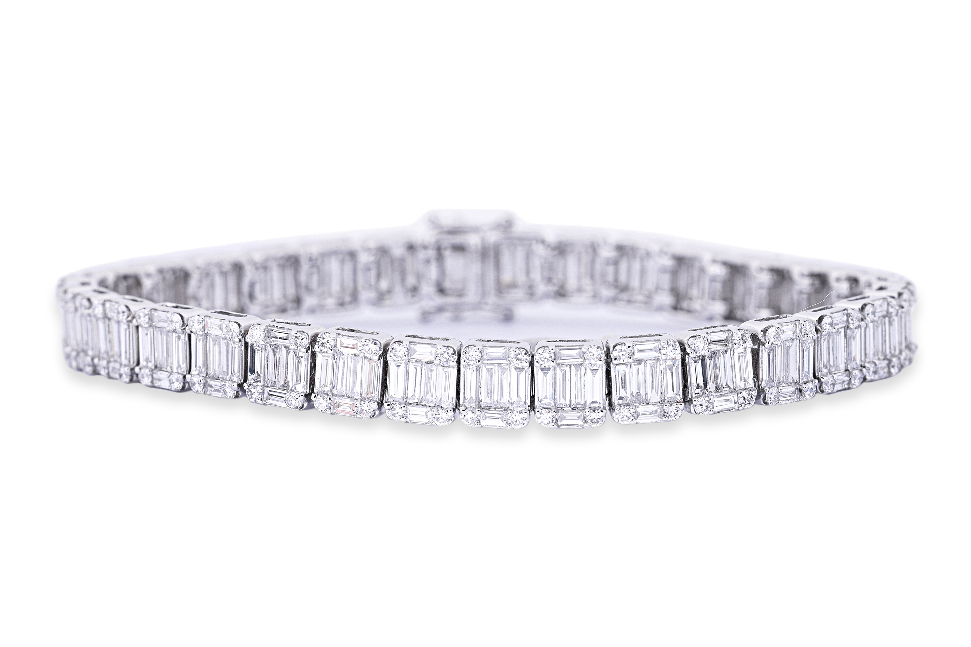 A BAGUETTE AND ROUND DIAMOND TENNIS BRACELET