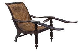 A TEAK 'CROCODILE' PLANTATION CHAIR