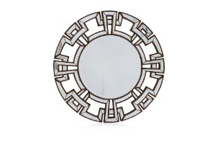 A CIRCULAR WALL MIRROR