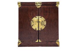 AN ORIENTAL BRASS MOUNTED FOLDOUT BAR CABINET