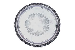 A CIRCULAR SILVER PLATED TRAY