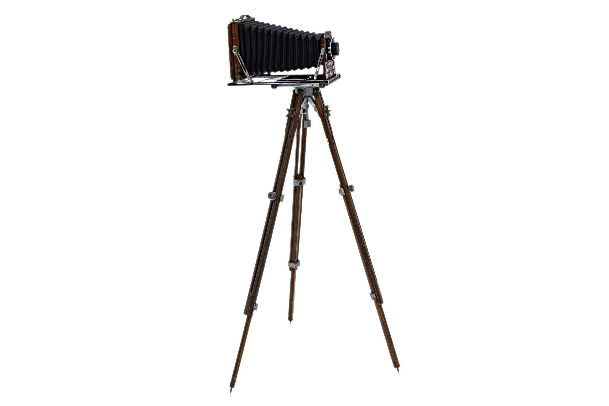 A MAHOGANY AND BRASS FOLD-OUT CAMERA ON TRIPOD