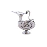 AN ITALIAN SILVER SHELL FORM EWER