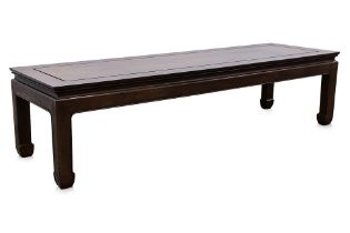 A LONG HARDWOOD LOW TABLE