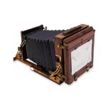 HAUGHTON ENSIGN HALF PLATE FIELD CAMERA AND EIGHT SLIDES