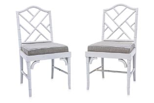 A PAIR OF WHITE LACQUERED CHAIRS