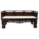 A CARVED AND PARCEL GILT WOOD BENCH