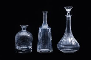 THREE ASSORTED CRYSTAL DECANTERS