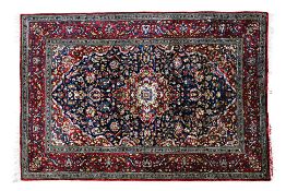 A MIDDLE EASTERN SILK RUG