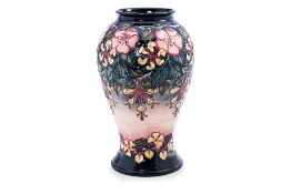 A LARGE MOORCROFT POTTERY OBERON PATTERN BALUSTER VASE