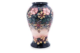 A LARGE MOORCROFT POTTERY OBERON PATTERN BALUSTER VASE