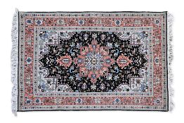 AN ORIENTAL STYLE MEDALLION RUG