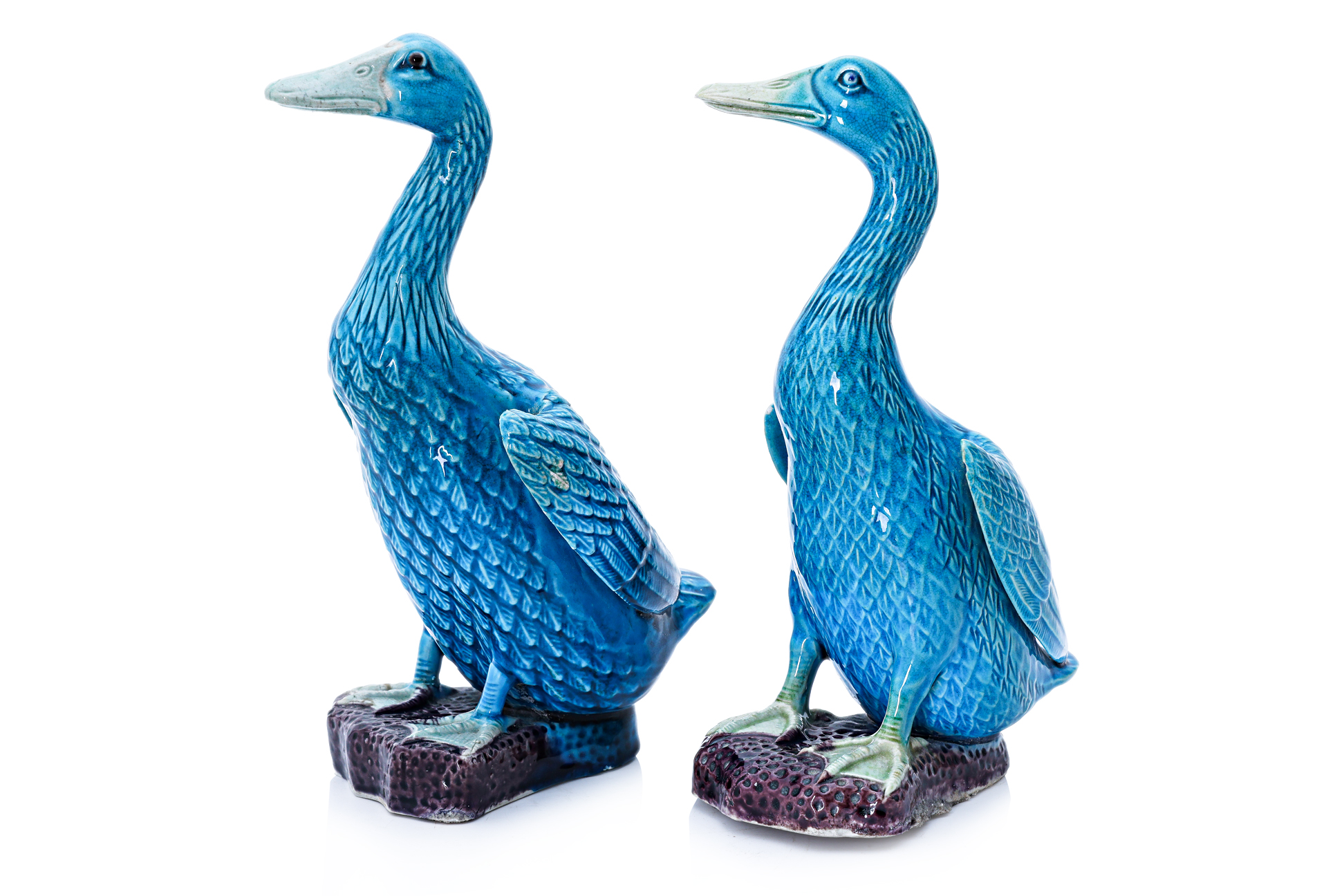 A PAIR OF CHINESE BLUE GLAZED POTTERY DUCKS