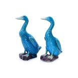 A PAIR OF CHINESE BLUE GLAZED POTTERY DUCKS