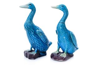 A PAIR OF CHINESE BLUE GLAZED POTTERY DUCKS