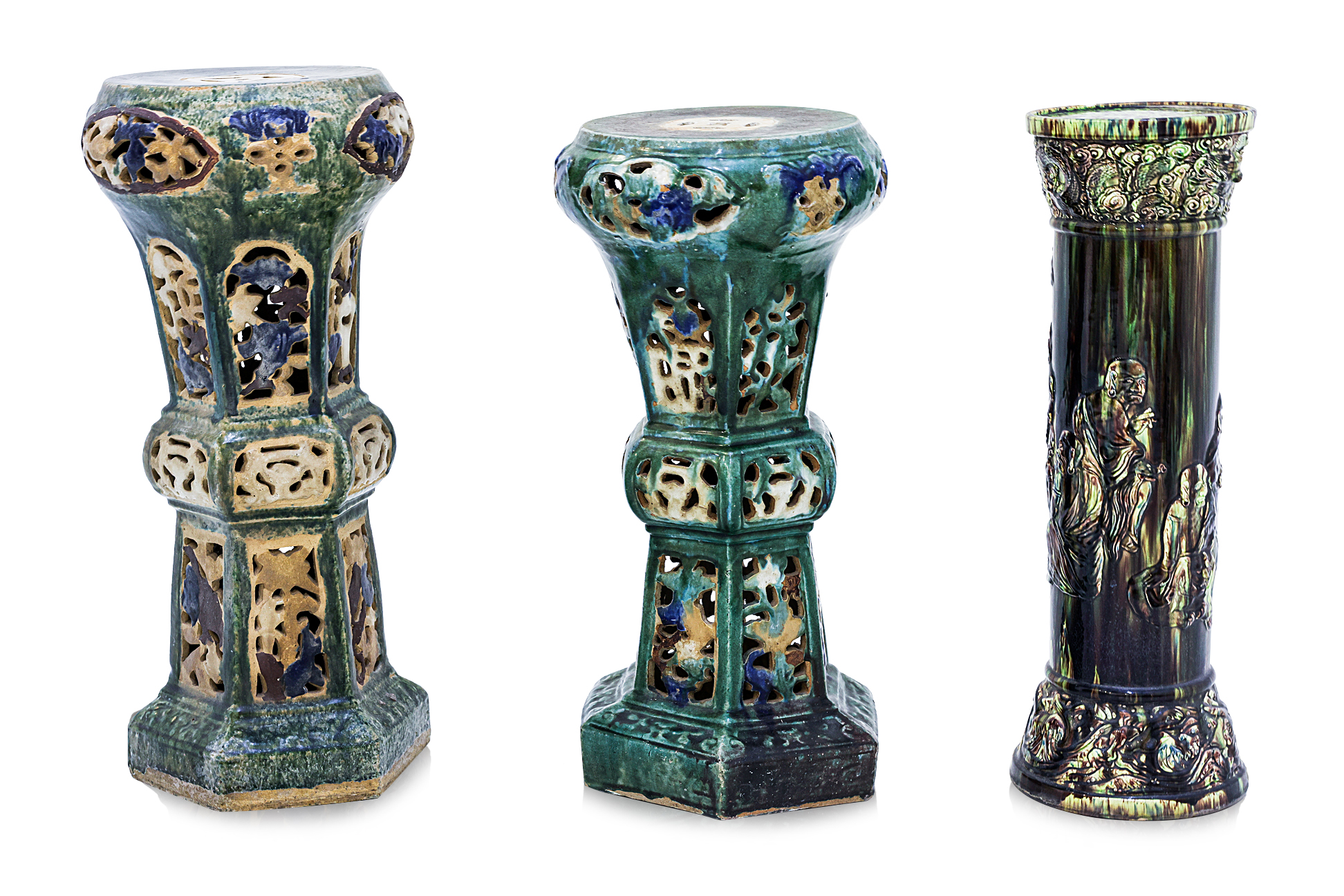 A GROUP OF THREE GREEN GLAZED POTTERY STANDS