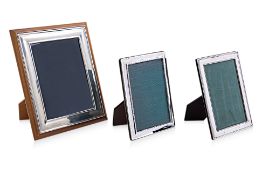 TWO ENGLISH SILVER AND ONE PEWTER PHOTOGRAPH FRAMES