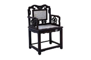 A MARBLE INSET BLACKWOOD ARMCHAIR