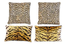 A GROUP OF ANIMAL PRINT THROW PILLOWS