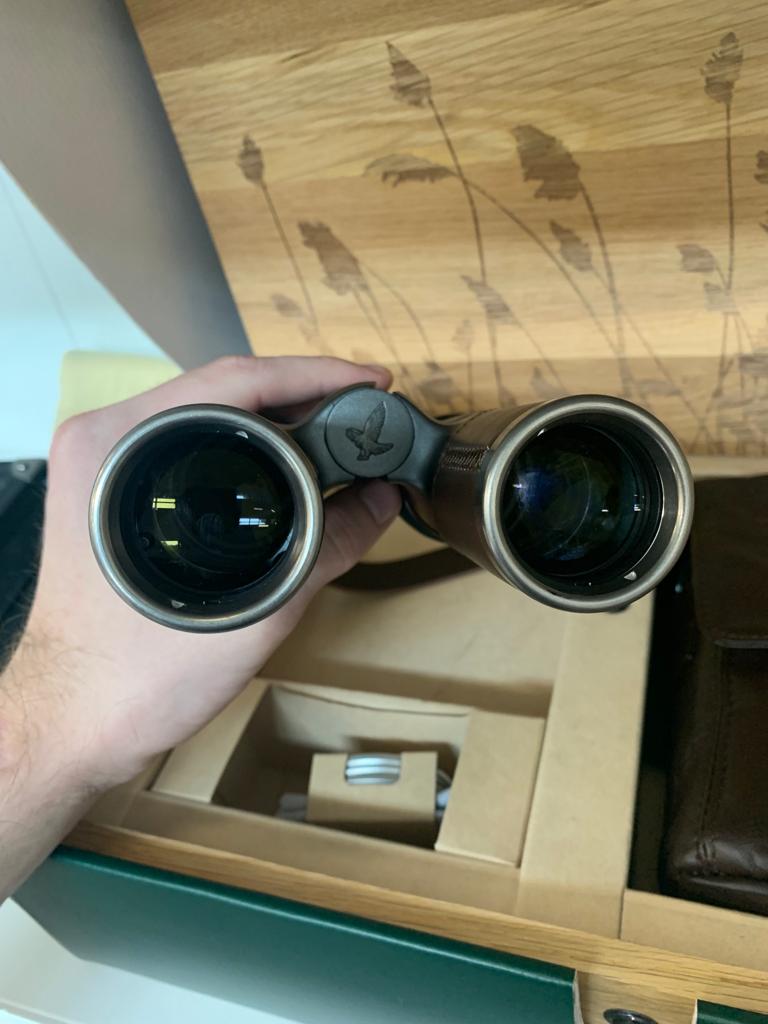 A PAIR OF SWAROVSKI OPTIK NOMAD BINOCULARS - Image 11 of 12