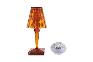 A KARTELL TABLE LAMP AND A CHRISTOFLE TEA LIGHT HOLDER