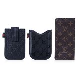 AN ASSORTMENT OF GUCCI AND OTHER DESIGNER LEATHER CASES