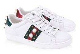 A PAIR OF GUCCI PEARL EMBELLISHED TRAINERS EU 35