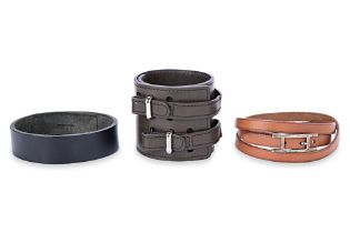 A GROUP OF THREE HERMES LEATHER BRACELETS