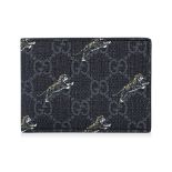 A GUCCI GG TIGER WALLET