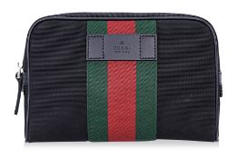 A GUCCI BLACK CANVAS WEB BELT BAG