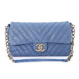 A CHANEL BLUE CHEVRON QUILTED FLAP BAG