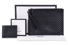 A GUCCI MICRO GG GUSSISSIMA CLUTCH AND MATCHING WALLET