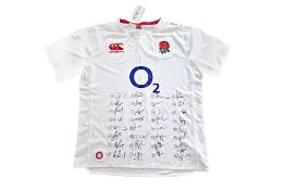 AN OFFICIAL ENGLAND 2016/17 JERSEY SIGNED BY SQUAD