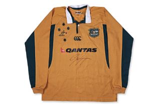 A 2006 AUSTRALIA RUGBY JERSEY SIGNED BY GEORGE GREGAN