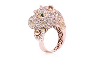 A HELIODOR, EMERALD AND DIAMOND 'LION' RING