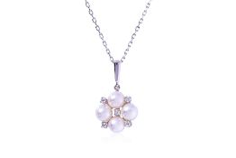 AN AKOYA CULTURED PEARL AND DIAMOND PENDANT BY MIKIMOTO