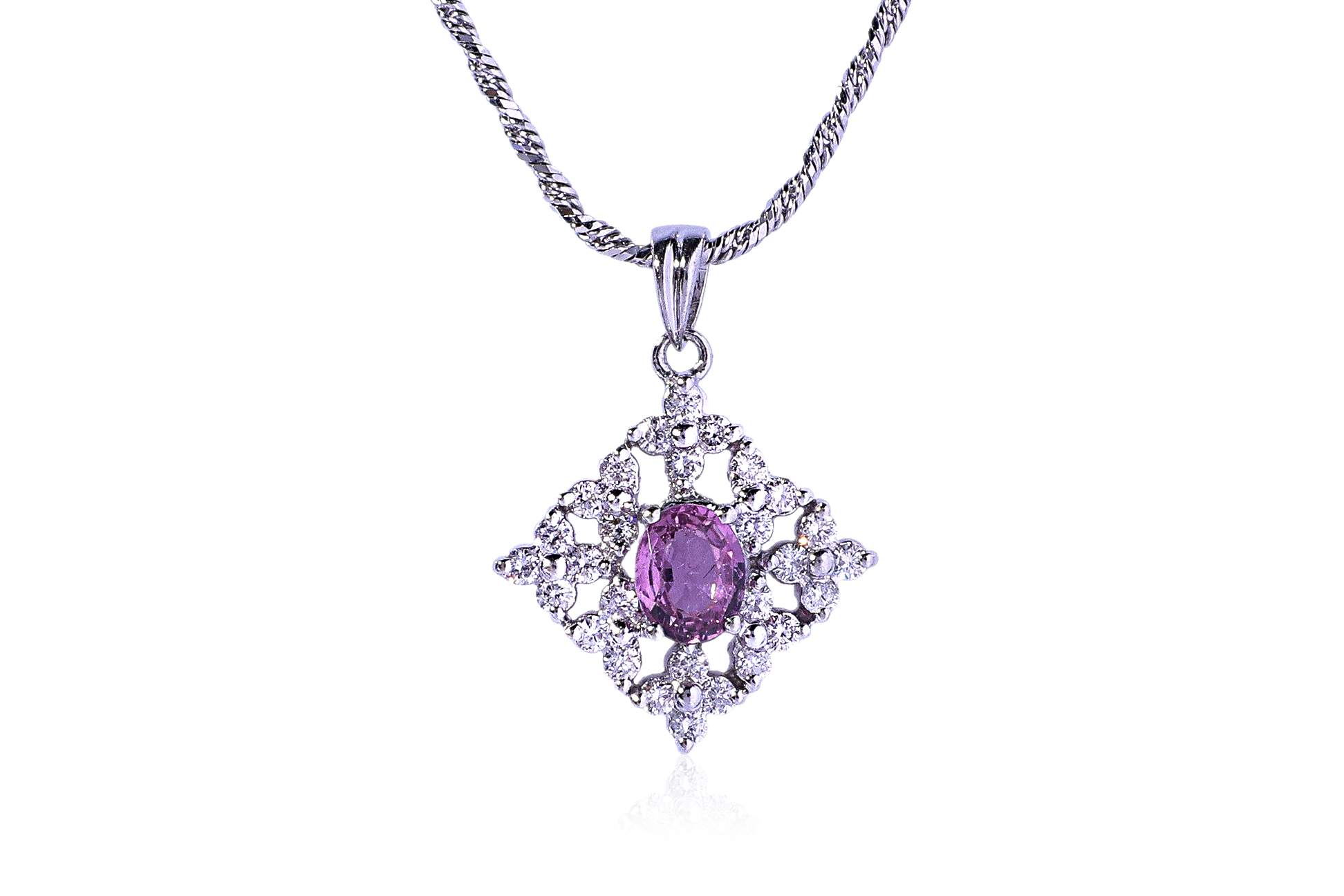 A PINK SAPPHIRE AND DIAMOND PENDANT ON A CHAIN